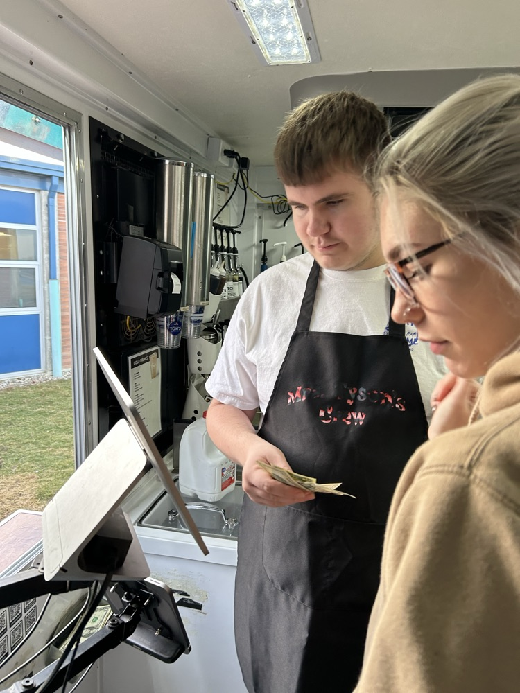 student taking order