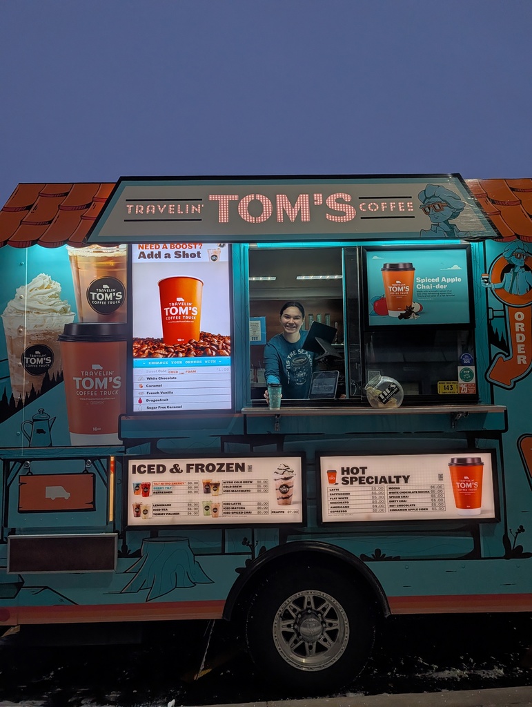 Coffee truck employee smiling