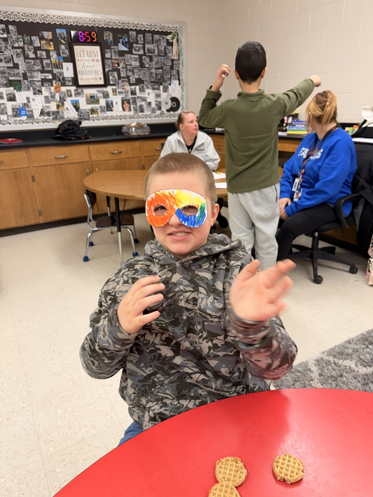 student with ninja mask on