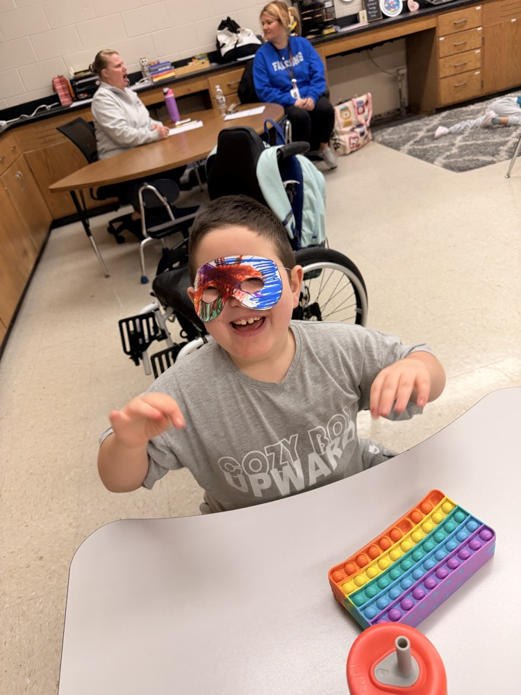 student with ninja mask on