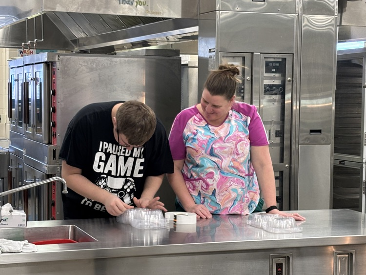 student working in cafeteria