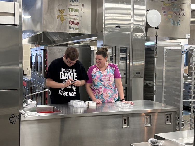 student working in cafeteria