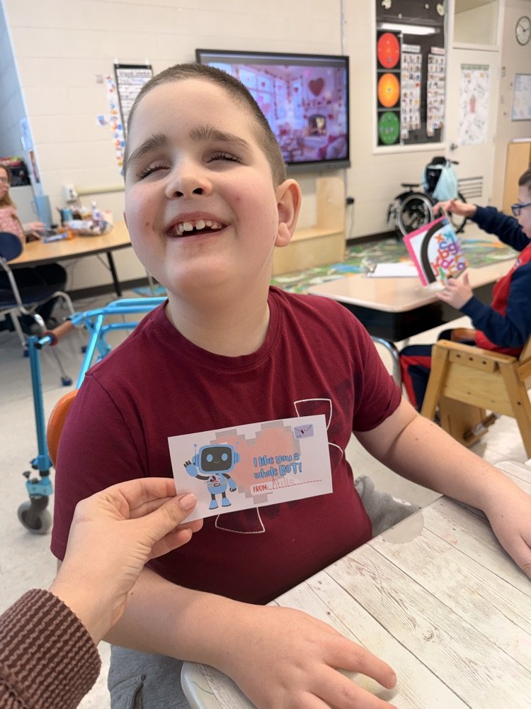 student making valentines