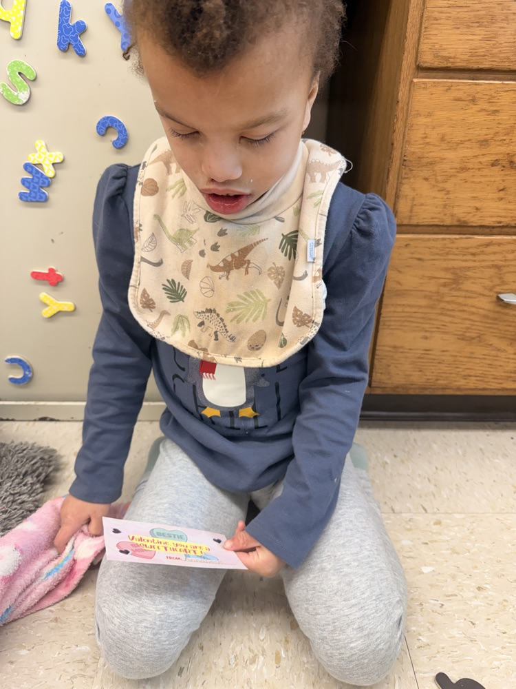 student making valentines