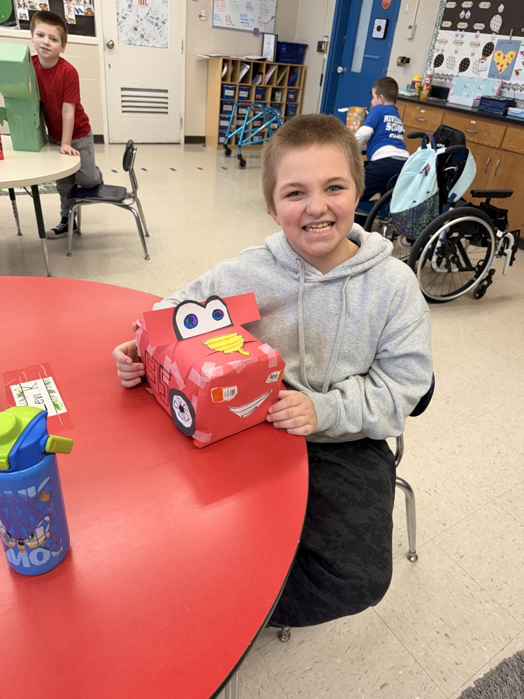 student with valentine box 