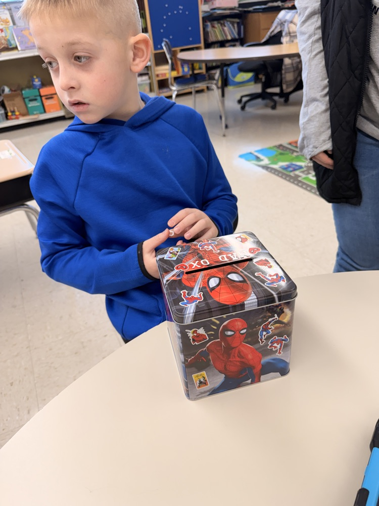 student with valentine box 