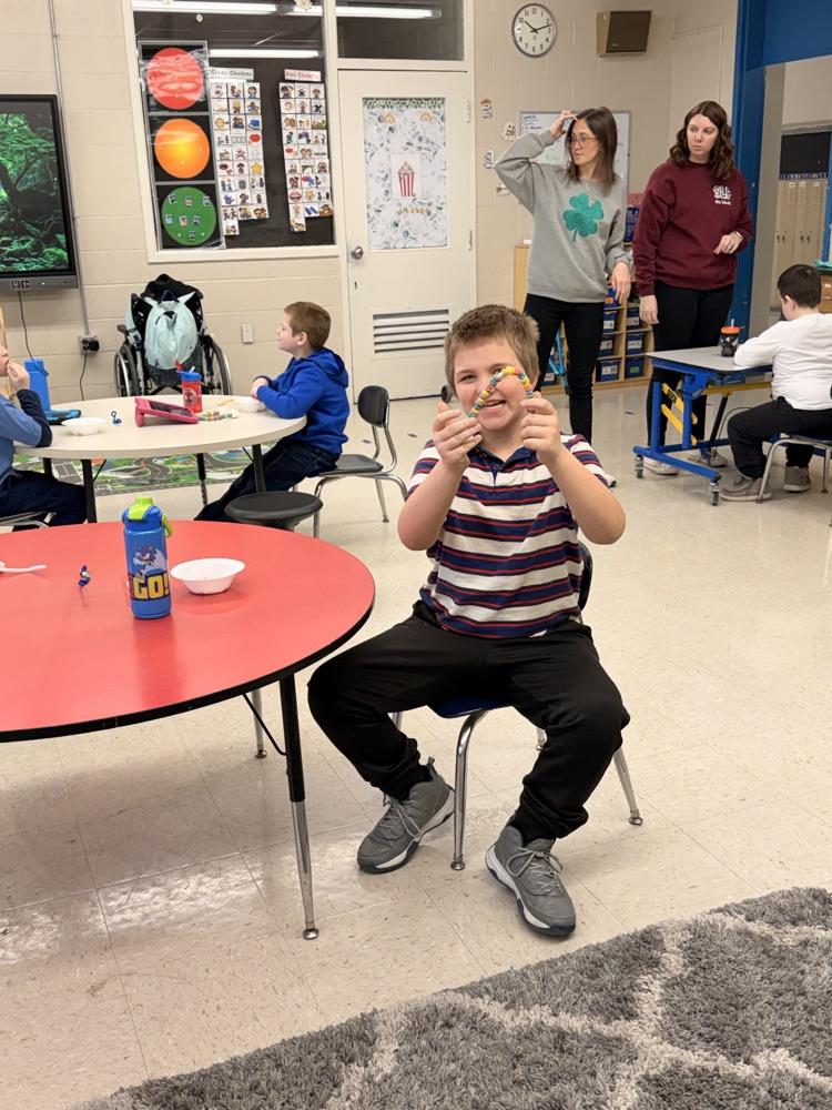 student with candy rainbow