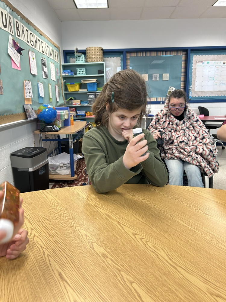 student with stress jar
