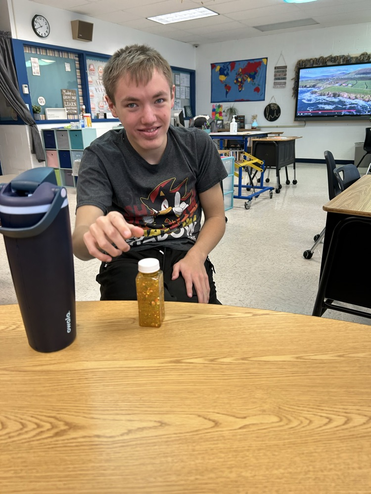 student with stress jar
