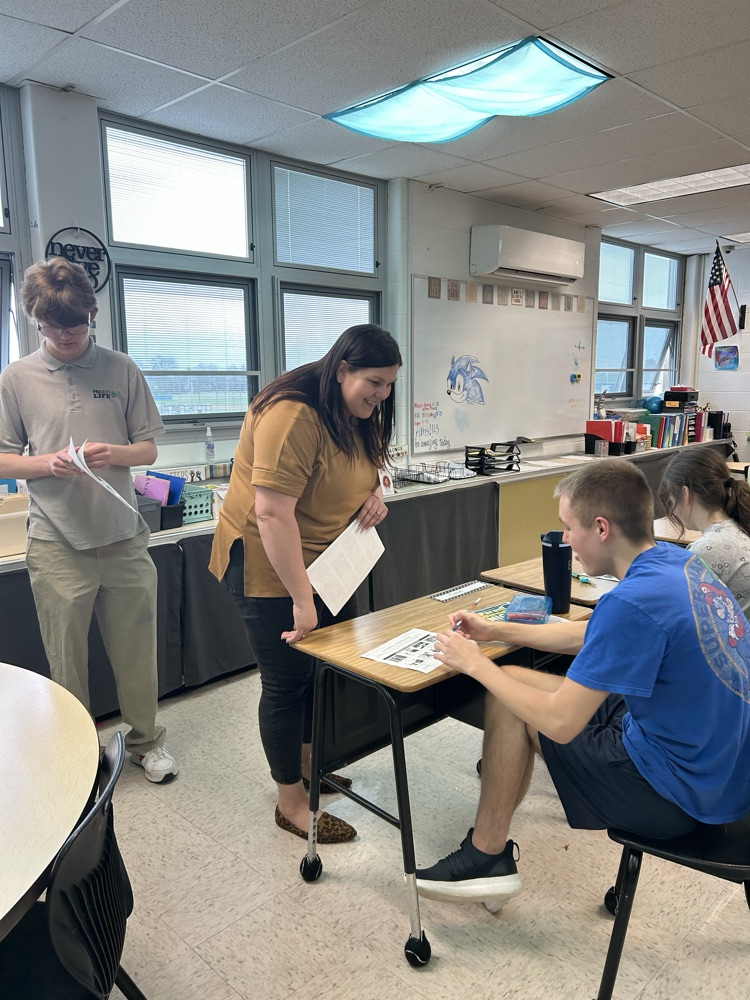 students with teacher