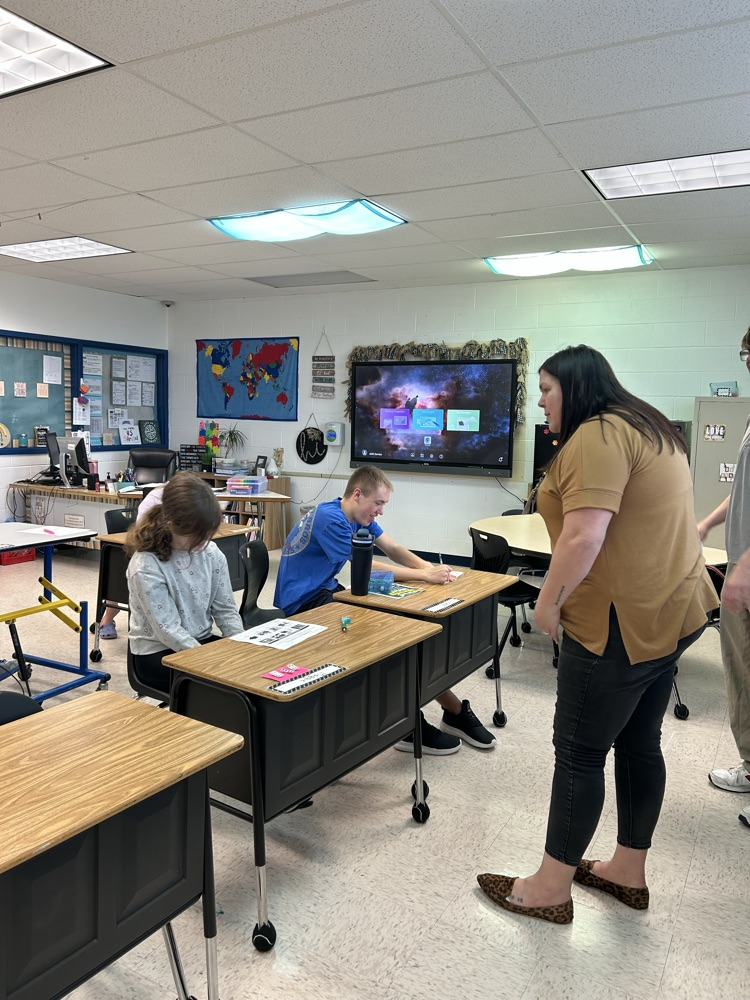 students with teacher