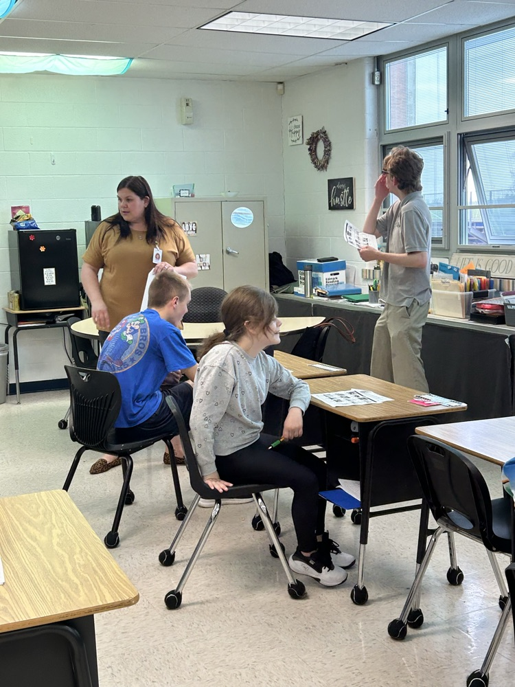 students with teacher