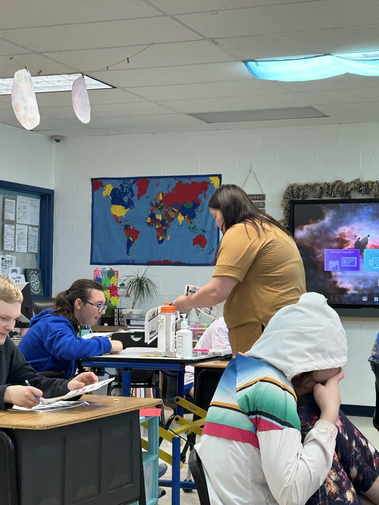 students with teacher