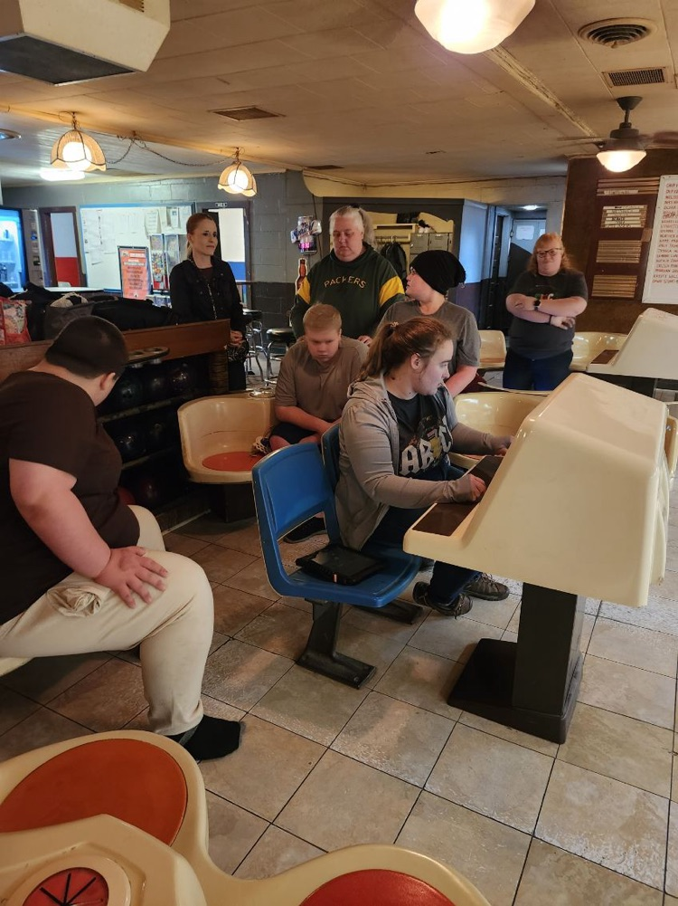 students at bowling alley