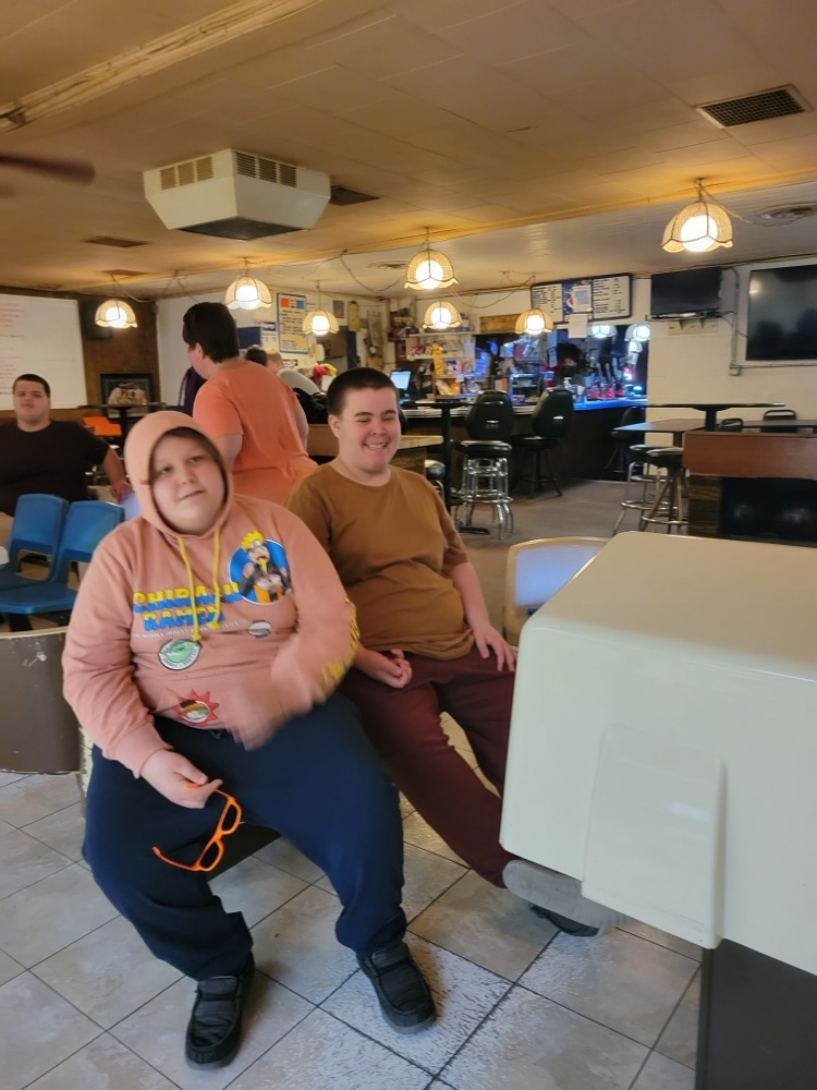 students at bowling alley