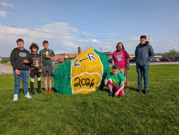 students with completed rock