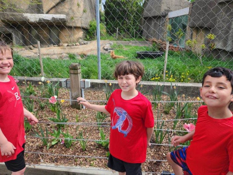 student and zoo animal