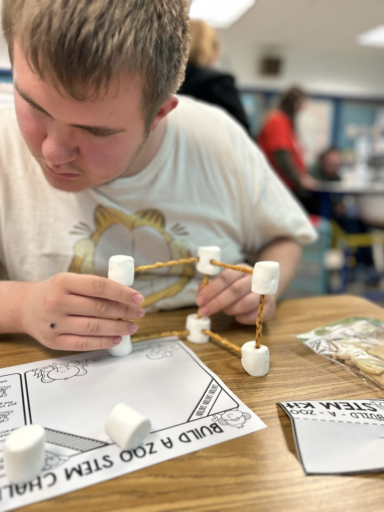 student with marshmallows
