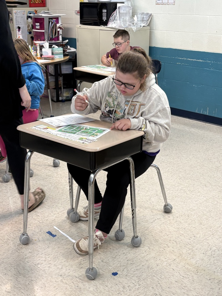 student doing zoo worksheet