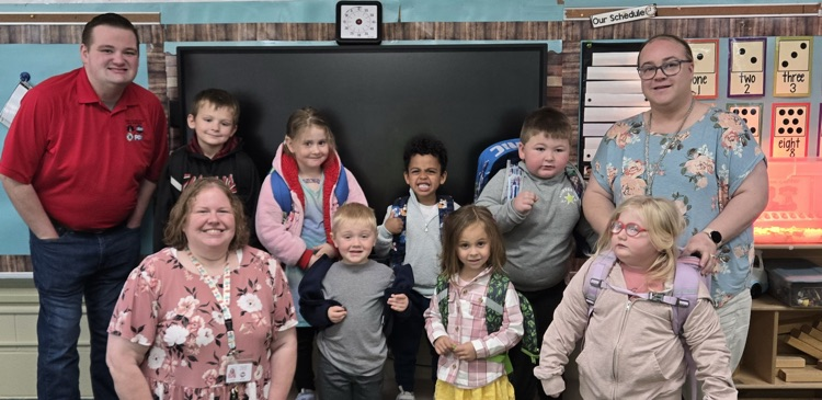 smiling students and teachers