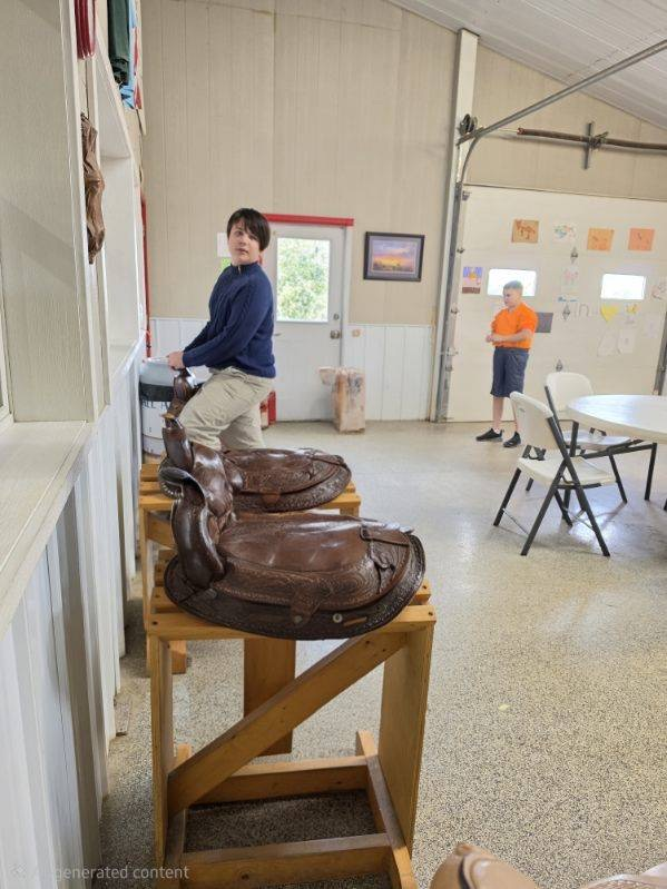 student sitting on horse saddle