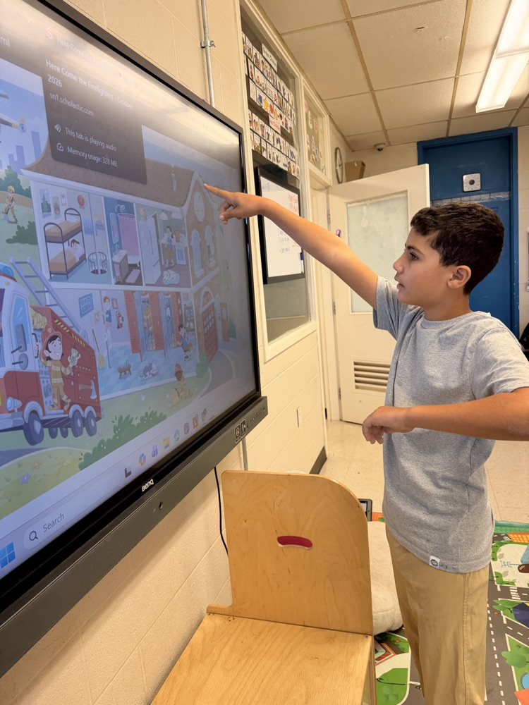 students doing an interactive firefighter game