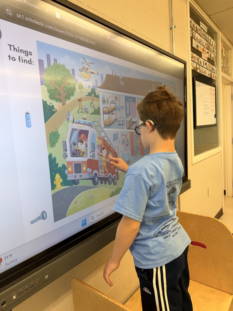 students doing an interactive firefighter game