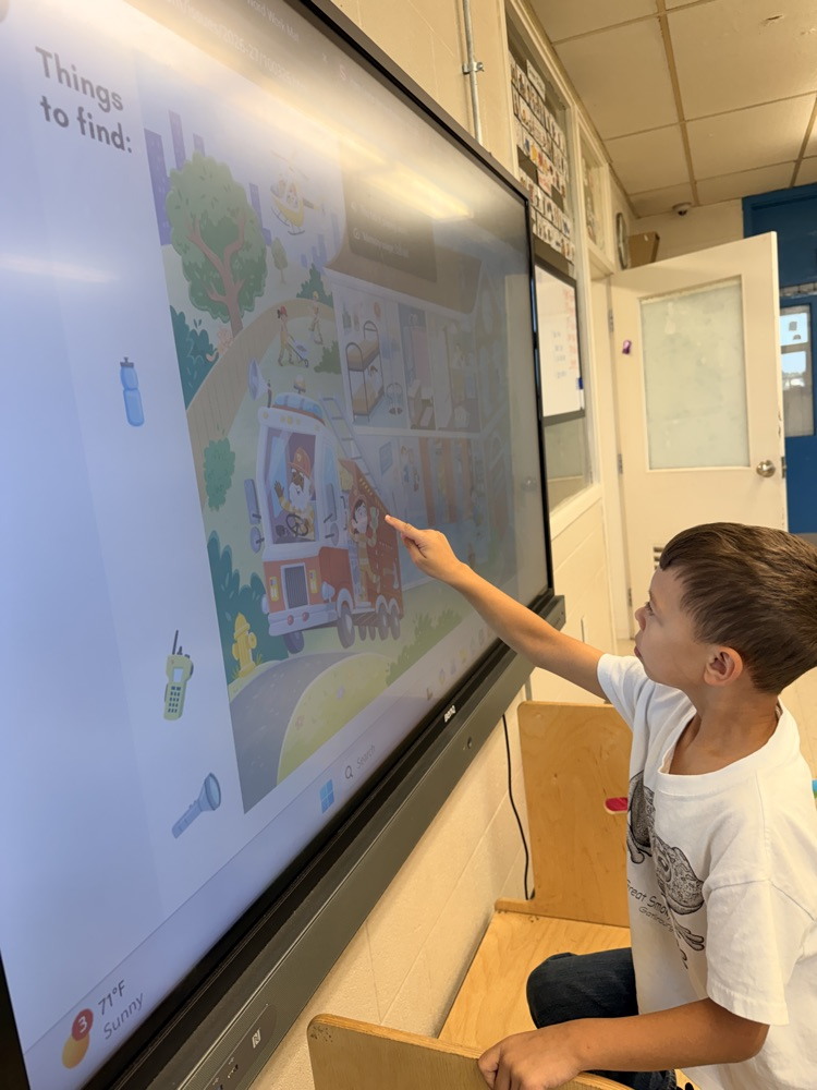 students doing an interactive firefighter game