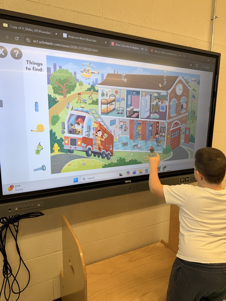 students doing an interactive firefighter game