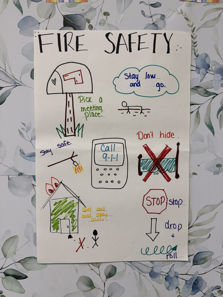 students sign about fire safety
