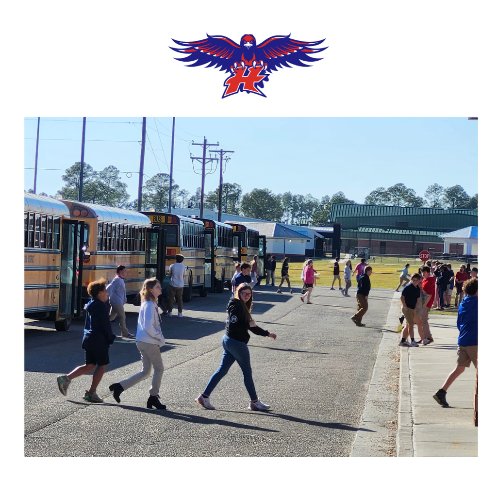 Students exiting school bus for emergency drill.