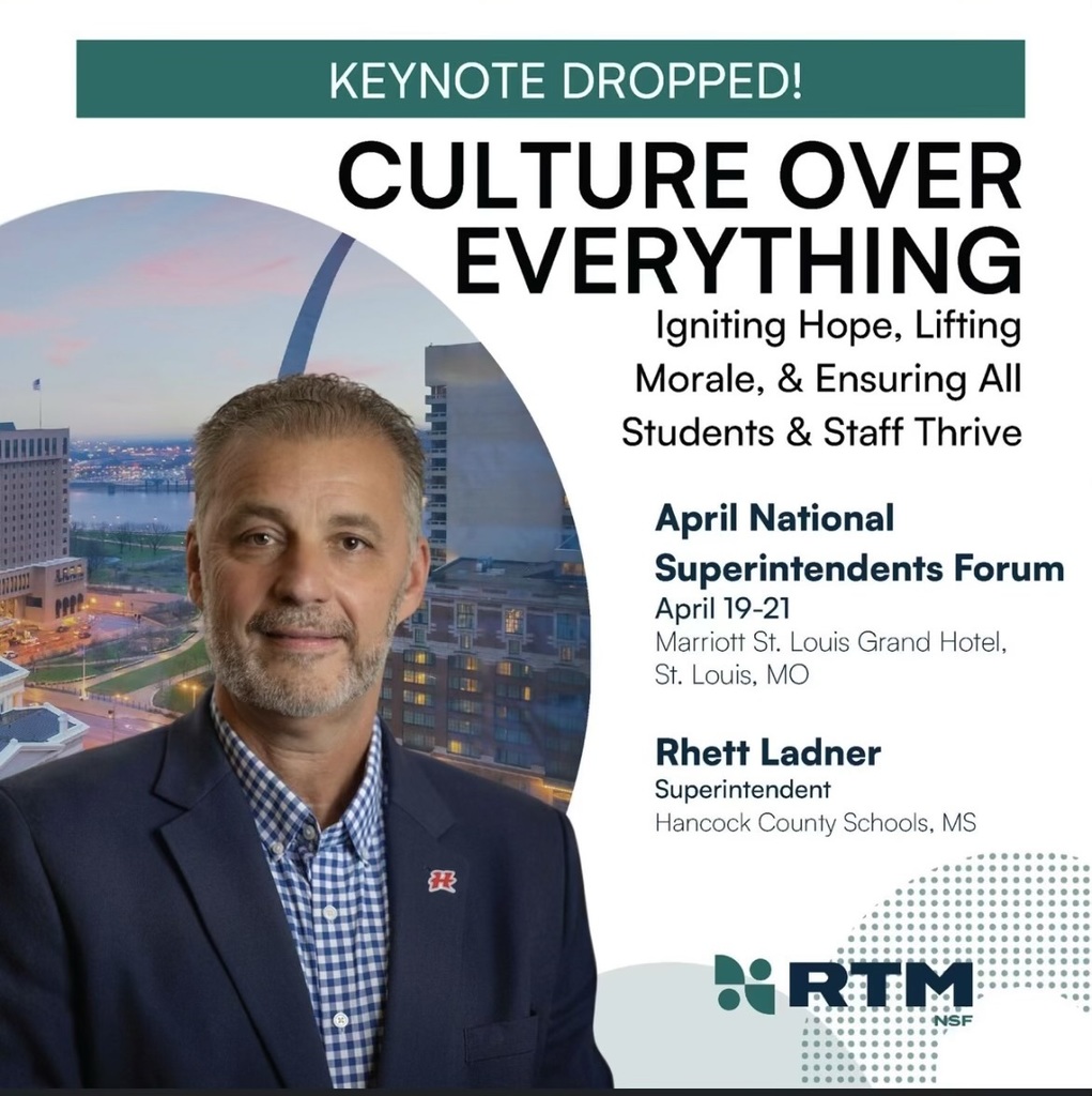 Rhett Ladner in blue and white button up covered with navy jacket and H pin on the lapel.