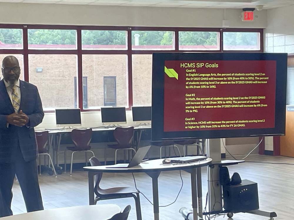 Principal Harris explaining the SIP.