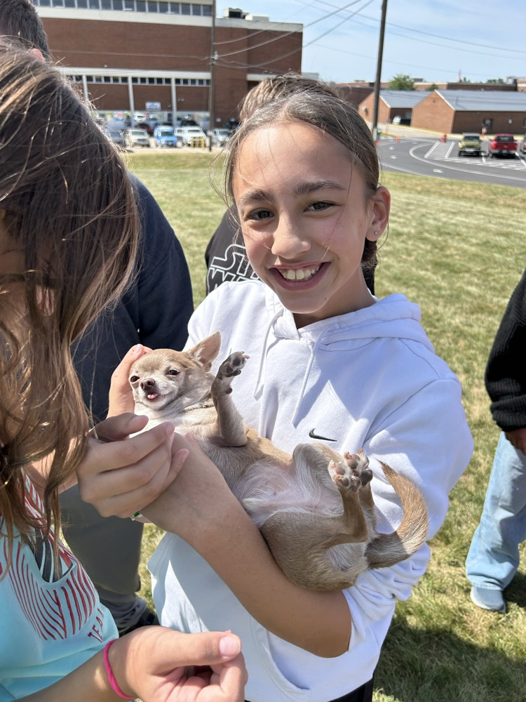 student and dog