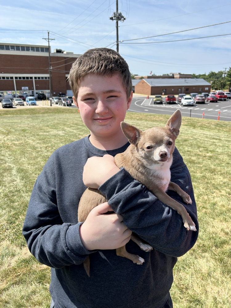 student and dog
