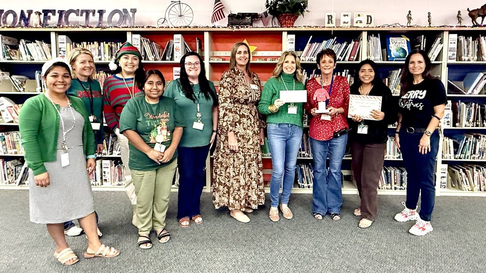 Hilltop Elementary Student Counsel with a check