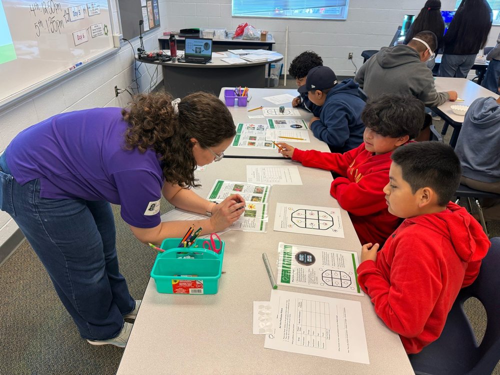 Orlando Science Center assists students with a project