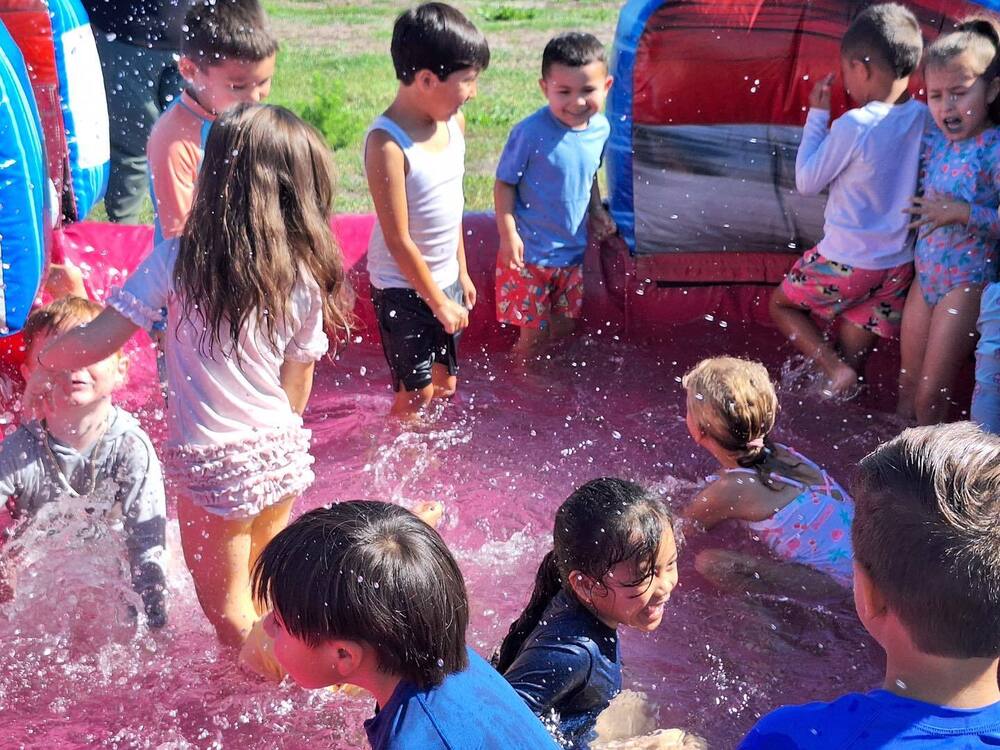 students splashing in the water