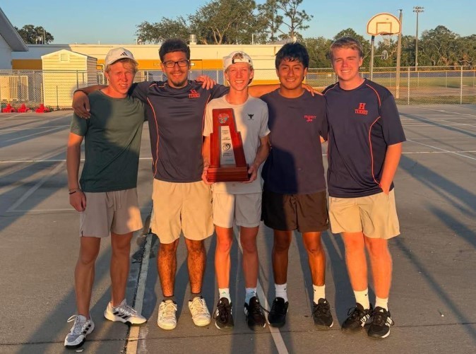 HHS Boys Tennis Team with their district runner-up trophy