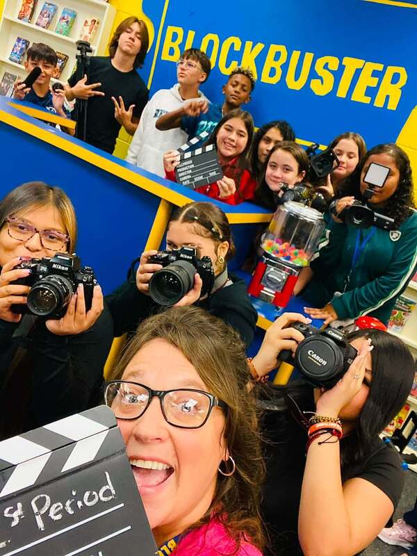 digital media class students with their camera equipment