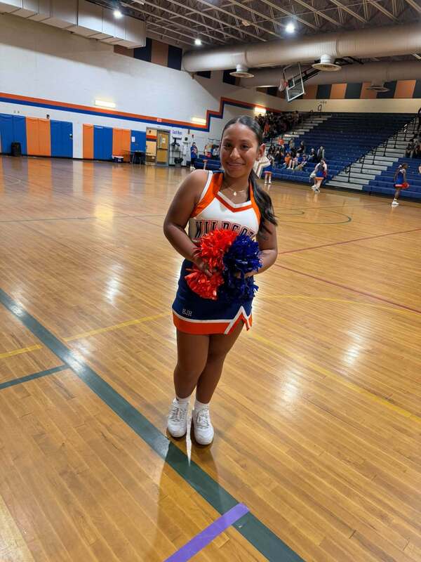 a cheerleader on the court