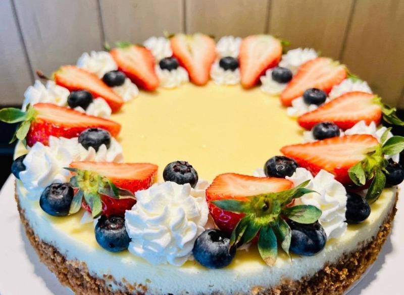 Classic Cheesecake topped with fresh berries by Sonia Deemer
