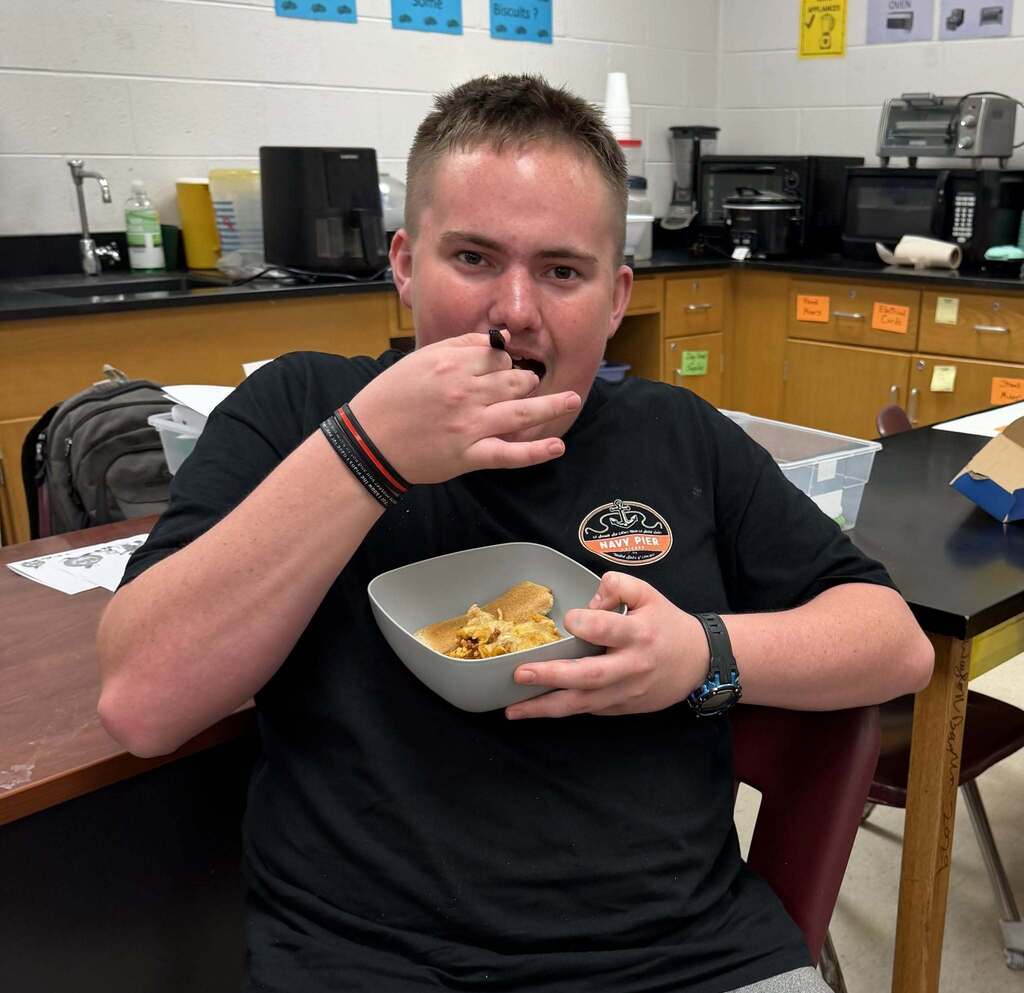 Principal Wilkerson sharing his favorite recipe with Courtesy Inc