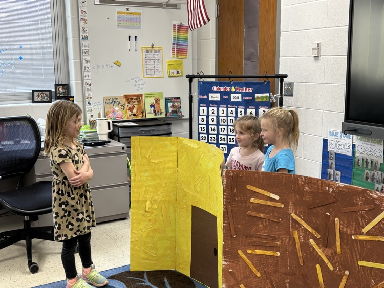 reenacting “ The Three Little Pigs"