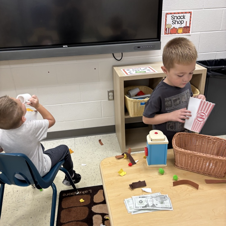 pretend play at dramatic center 