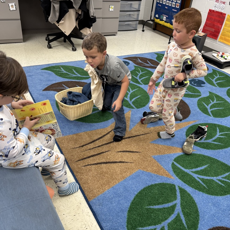 reenacting our story and looking at books 