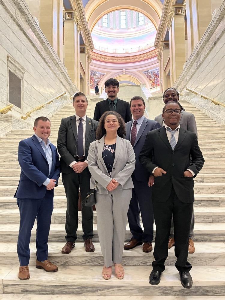 Three HCP Seniors stand at the capitol with Ms. Stefanick, Mr. Hughes, Superintendent of Education for Oklahoma Lindel Fields, and Oklahoma Secretary of Education Dan Hamlin