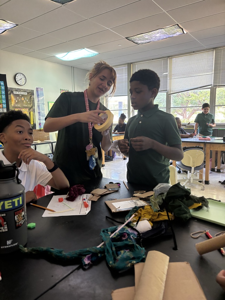 7th and 8th grade students creating Wind Cars.