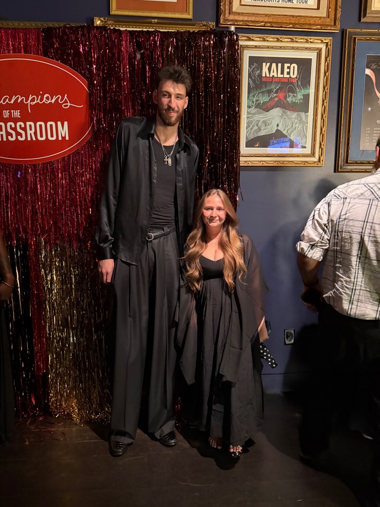 HCP Middle School Teacher, Cassidy Scarbrough pictures with OKC Thunder Player, Chet Holmgren