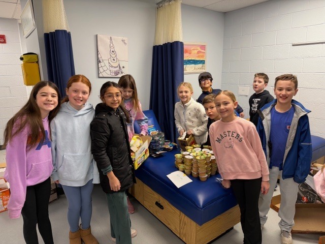 Climate & Culture Club packing bags for Nourish NJ